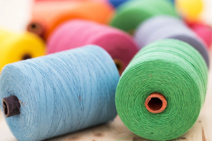 Acrylic yarns undergoing high-temperature dyeing at Pamchal factory