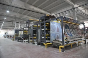 CNC machine cutting curved carpet edges for custom mosque installation